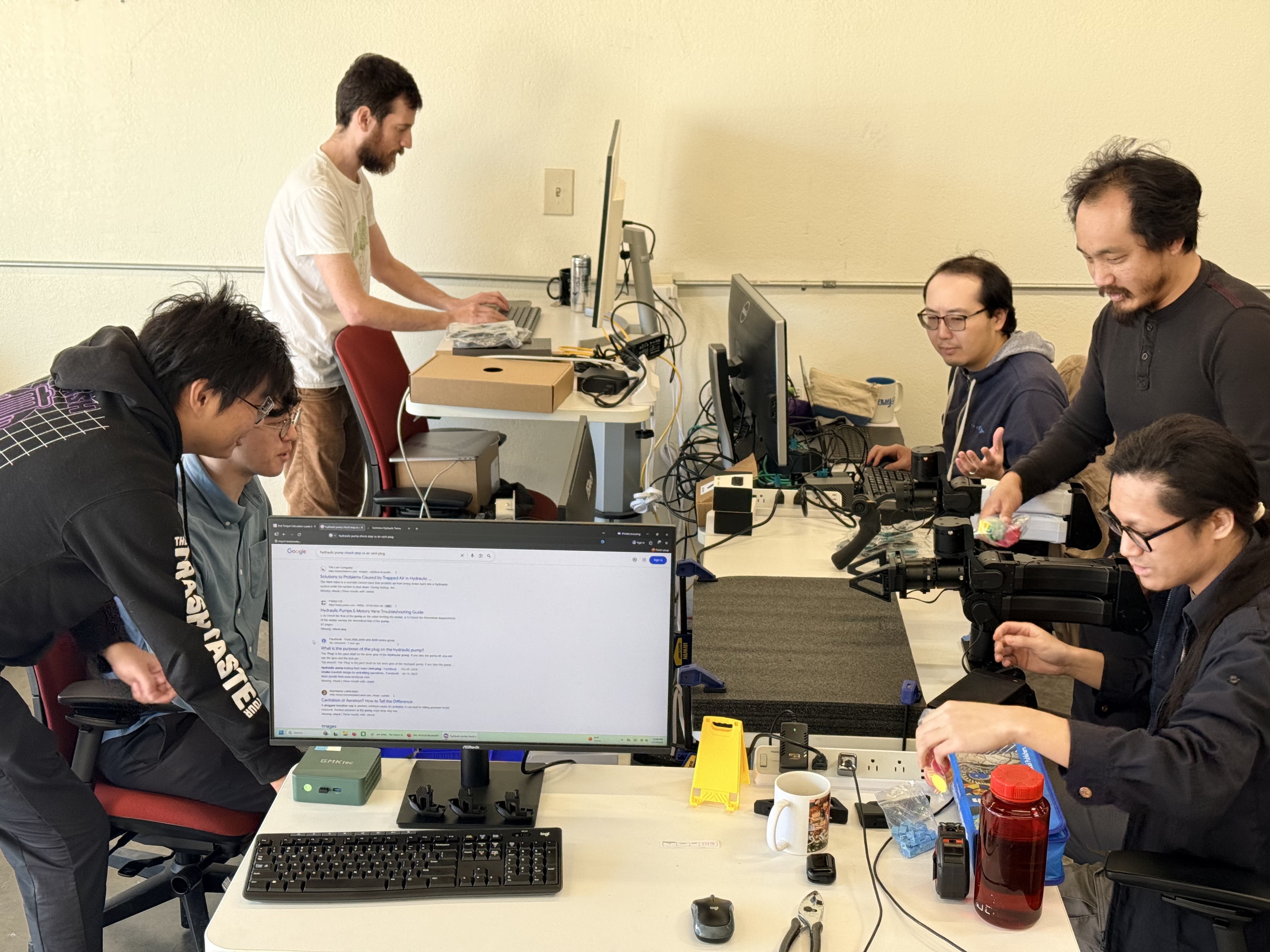 Team collaborating on the robot